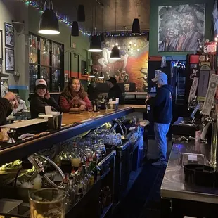 people sitting at the bar