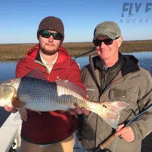 Father and son redfishing near Rockport, Texas