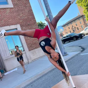 First Friday at the KC Crossroads - booth and workshop station setup. Portable pole placement and free lessons - volunteer: Perrin PoleFit