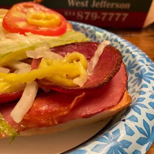 Crispy edged curled up salami on the Italian - Our Best Seller Sandwich