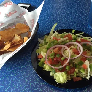 Homemade chips and house salad
