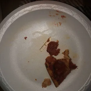 Pizza with glass in it