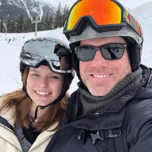 a man and a woman taking a selfie