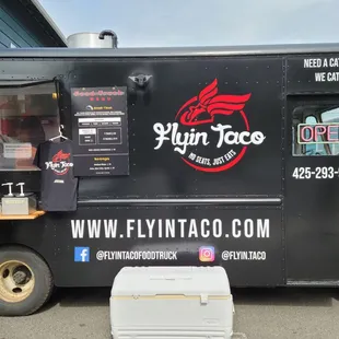 a food truck parked in a parking lot