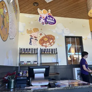 a woman standing at the counter