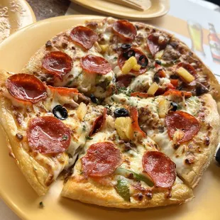 a slice of pizza on a plate