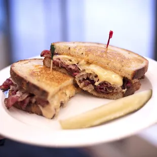 Pastrami, Swiss, sauerkraut, and Russian dressing on our light rye