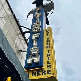 a neon sign for a restaurant
