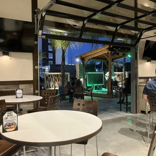 Patio seating overlooking live act