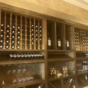 wine bottles on shelves