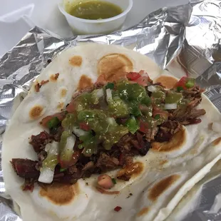 Brisket taco with Pico &amp; Salsa Verde.