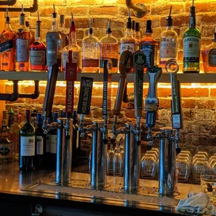 Craft beer taps.