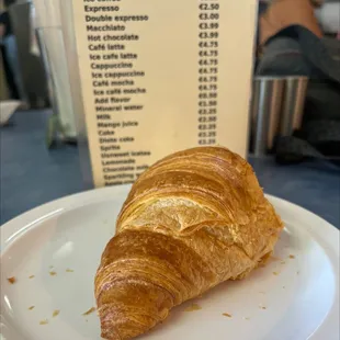 a croissant on a plate