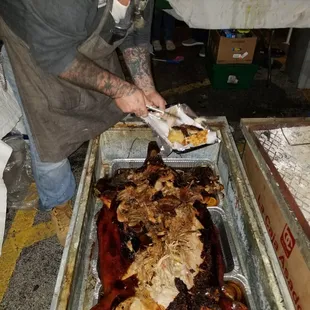 Ralph serving up crispy lechon