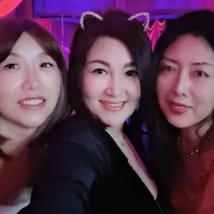 three women posing for a picture