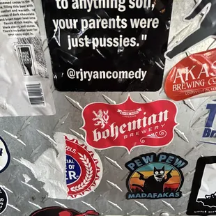 stickers on the side of a refrigerator