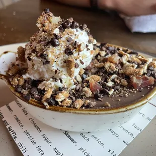 Bitter Chocolate Pots de Crème pretzel and cocoa nib crumble. orange. bacon.