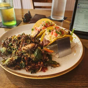 Tuesday special tacos with braised pork and pimento cheese. Crispy Brussels were the perfect side to complement.