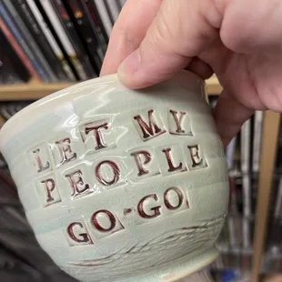 Handmade one of a king pottery mugs by Paul Mallory. Pick from your favorite Rainmakers lyrics.