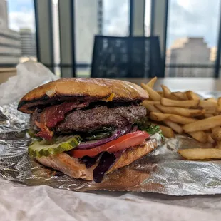 focaccia burger $16 (1/2 pound patty, bacon, cheese)