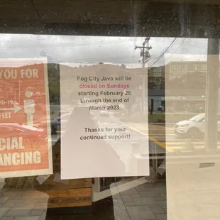 a sign in the window of a restaurant