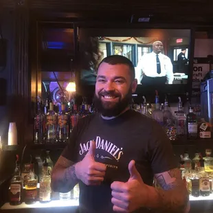a man giving a thumbs up