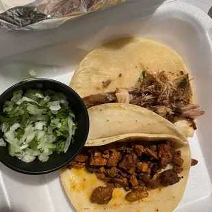 Al pastor on the bottom Carnitas on the top