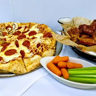 two pizzas and carrots