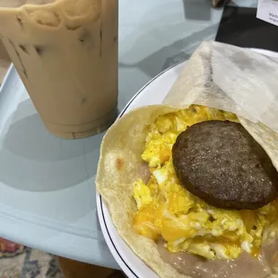 Caramel iced coffee and a sausage breakfast burrito