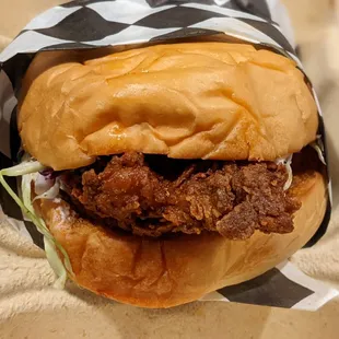 Fried Chicken Sandwich w/ slaw, pickles, aioli