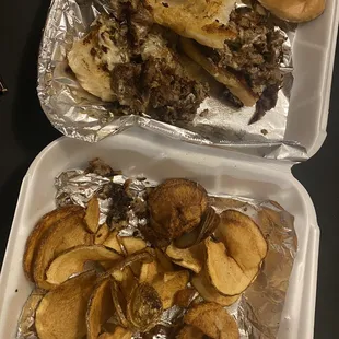 Burned Philly cheese steak and homemade chips
