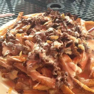 Philly cheese steak smothered fries. Yummy.