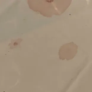 Blood-splattered tablecloth