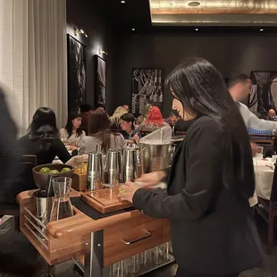 Erica making a fresh caipirinha by our table