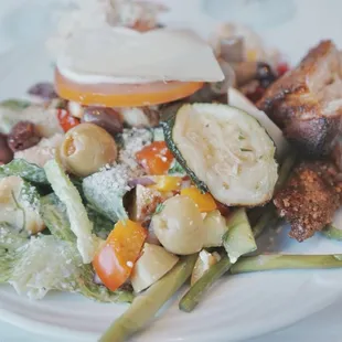 My plate from the salad bar. My first meat drop is somewhere in that pile.