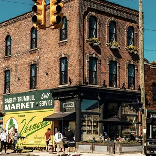 a large brick building on a corner
