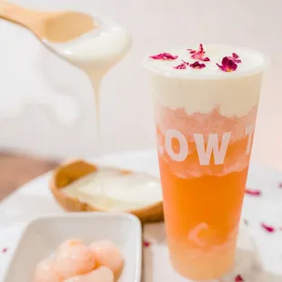a glass of tea and a bowl of ice cream