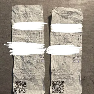 two pieces of paper with qr code on them
