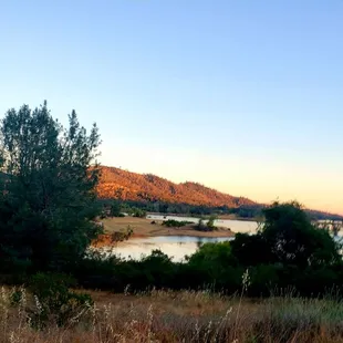 On a sunset trail ride around the backside of Folsom Lake