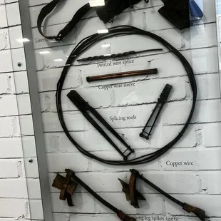 Tools used to climb poles and work on lines