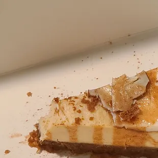 The cheesecake was old and hard, you can see from the picture the top was so dried up it was breaking.  I can't eat it, it's tash.