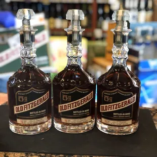 three bottles of whiskey