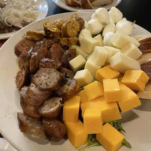 Chicken sausage with Buffalo bleu cheese; Wisconsin brat; and Hungarian Sausage (great spice) with cheddar, Swiss and mozzarella.