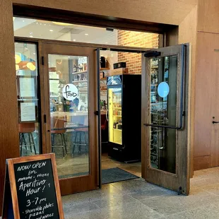 the entrance to a coffee shop