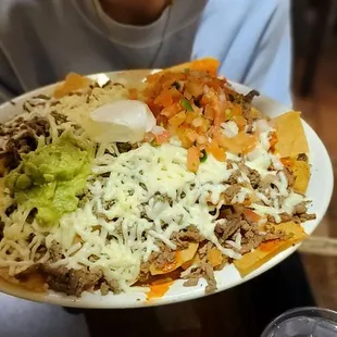 Nachos are MASSIVE.... My daughter had 2 boxes of left OverS