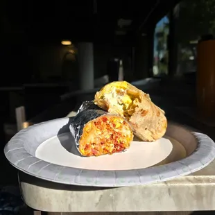 Chorizo breakfast burrito and Verde chiliquiles burrito