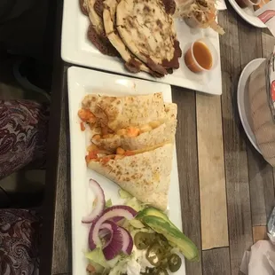 Shrimp quesadillas and bean and cheese pepusas