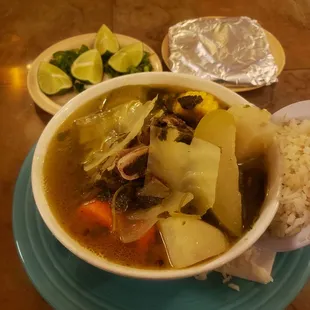 a bowl of soup and rice