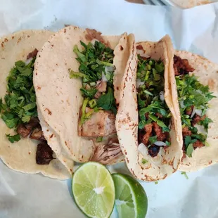 Lengua, carnitas, al pastor, and chorizo tacos