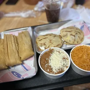 Chicken gorditas, rice, beans &amp; tamales.